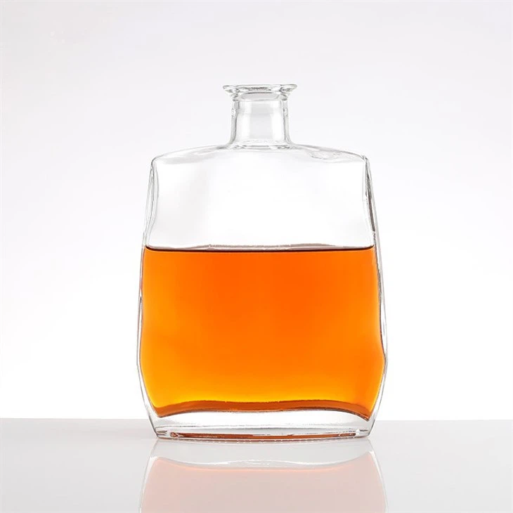 Simple Golden-Lidded Transparent Glass Bottle